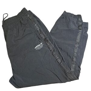Adidas Originals Medium Logo Tape Nylon Track Pants “Brand With The 3 Stripes”